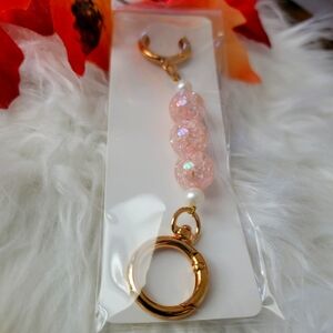 Elegant Pink and Gold Bag Accessory